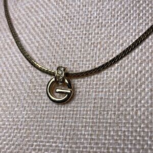 Givenchy 24K gold plated iconic G and tiny crystal necklace EUC
